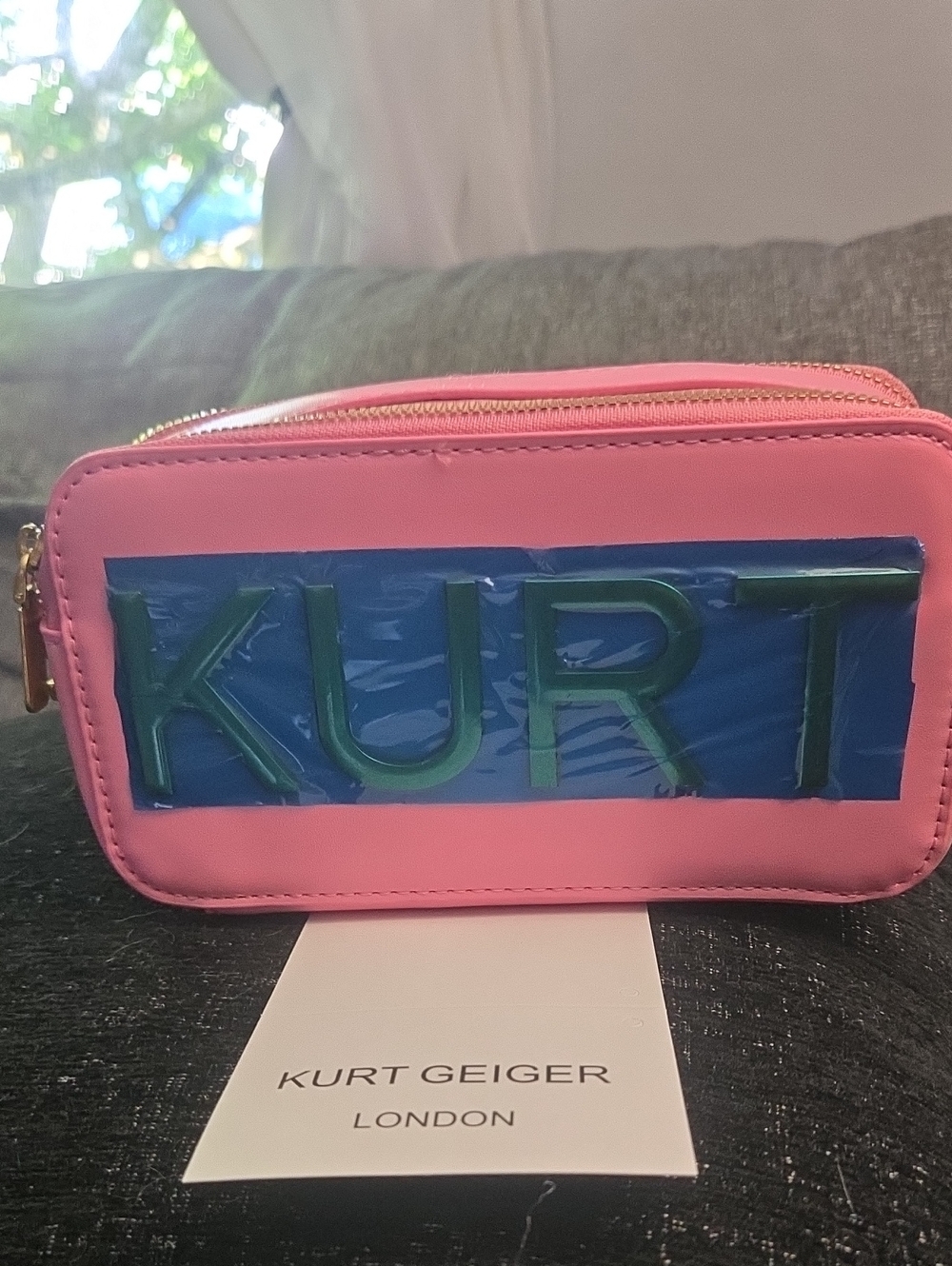 Kurt Geiger Pink Crossbody Strap Pouch with Gold Pannel